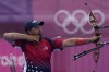 FILE - United States' Brady Ellison releases an arrow during the men's team quarterfinal match between United States and Japan at the 2020 Summer Olympics, Monday, July 26, 2021, in Tokyo, Japan. Ellison is a three-time Olympic medalist who has qualified for his fifth Olympics. He has won two Olympic silver medals, but never gold. At age 35, he is not sure how many more chances he will get. (AP Photo/Alessandra Tarantino, File)