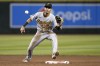 FILE - Pittsburgh Pirates shortstop Tucupita Marcano takes a throw down to second base during the fifth inning of a baseball game against the Arizona Diamondbacks, July 7, 2023, in Phoenix. San Diego Padres' Marcano is under investigation by Major League Baseball for allegedly betting on baseball and could be subject to a possible lifetime ban, according to a person familiar with the probe who spoke to The Associated Press on condition of anonymity because the investigation is ongoing. (AP Photo/Ross D. Franklin, File)