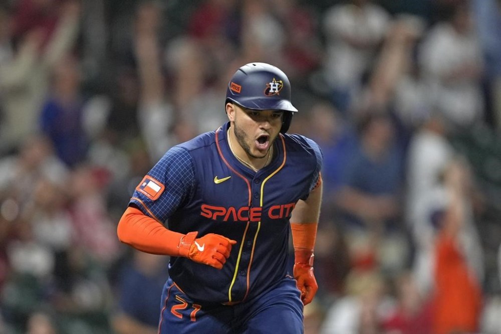 Houston Astros' Yainer Diaz celebrates after hitting a two-run home run against the St. Louis Cardinals during the eighth inning of a baseball game Monday, June 3, 2024, in Houston. (AP Photo/David J. Phillip)