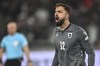 FILE - Georgia goalkeeper Giorgi Mamardashvili reacts after his save during a penalty shootout at the end of the Euro 2024 qualifying play-off soccer match between Georgia and Greece at the Boris Paichadze National Stadium in Tbilisi, Georgia, Tuesday, March 26, 2024. (AP Photo/Tamuna Kulumbegashvili, File)