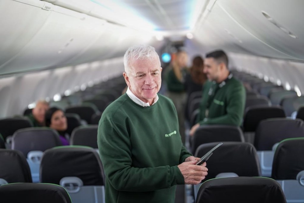 Flair Airlines chief executive Stephen Jones will be stepping down this summer after more than three-and-a-half years at the helm of the discount carrier. Jones speaks with employees aboard on one of the company's Boeing 737 MAX 8 aircraft after the airline announced their sustainability initiatives, in Richmond, B.C., Wednesday, April 17, 2024. THE CANADIAN PRESS/Darryl Dyck