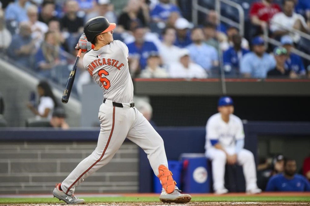 Baltimore Orioles' Ryan Mountcastle (6) hits a three-run home run during third inning MLB baseball action against the Toronto Blue Jays, in Toronto on Tuesday, June 4, 2024. THE CANADIAN PRESS/Christopher Katsarov