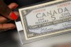 A 1954 Bank of Canada five dollar note is displayed at the Bank of Canada museum store in Ottawa on Wednesday, July 12, 2023. THE CANADIAN PRESS/Sean Kilpatrick