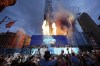 Manchester City players, staff and fans celebrate during a trophy parade in Manchester, England, Sunday, May 26, 2024, after winning their fourth successive Premier League title. (Martin Rickett/PA via AP)