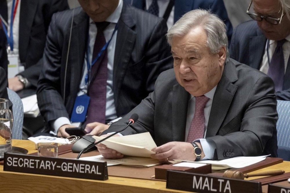 FILE - United Nations Secretary General Antonio Guterres speak during a Security Council meeting at the United Nations headquarters, April 18, 2024. U.N. Secretary General António Guterres called Wednesday, June 5, 2024, for a “windfall” tax on profits of fossil fuel companies to help pay for the fight against global warming, decrying them as the “godfathers of climate chaos.” (AP Photo/Yuki Iwamura, File)