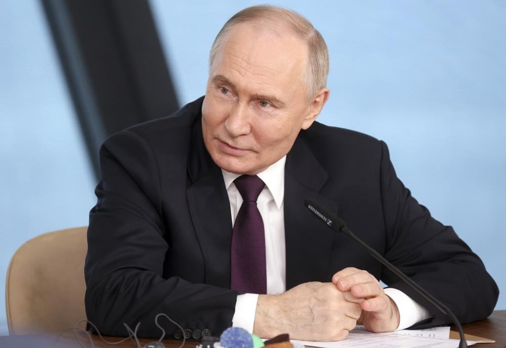 Russian President Vladimir Putin speaks to senior news leaders of international news agencies on the sidelines of the St. Petersburg International Economic Forum at the Lakhta Center skyscraper, the headquarters of Russian gas monopoly Gazprom in St. Petersburg, Russia, on Wednesday, June 5, 2024. The Russian leader has used the annual forum as a showcase for touting Russia's development and seeking investors. (Valentina Pevtsova, Sputnik, Kremlin Pool Photo via AP)