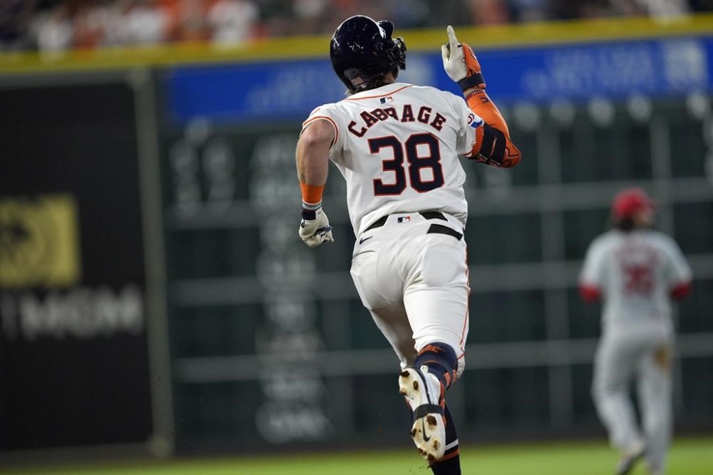 Houston Astros' Trey Cabbage celebrates after hitting a home run against the St. Louis Cardinals during the fifth inning of a baseball game Wednesday, June 5, 2024, in Houston. (AP Photo/David J. Phillip)