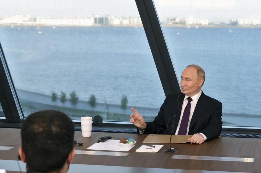 Russian President Vladimir Putin speaks to senior news leaders of international news agencies on the sidelines of the St. Petersburg International Economic Forum at the Lakhta Center skyscraper, the headquarters of Russian gas monopoly Gazprom in St. Petersburg, Russia, on Wednesday, June 5, 2024. The Russian leader has used the annual forum as a showcase for touting Russia's development and seeking investors. (Valentina Pevtsova, Sputnik, Kremlin Pool Photo via AP)