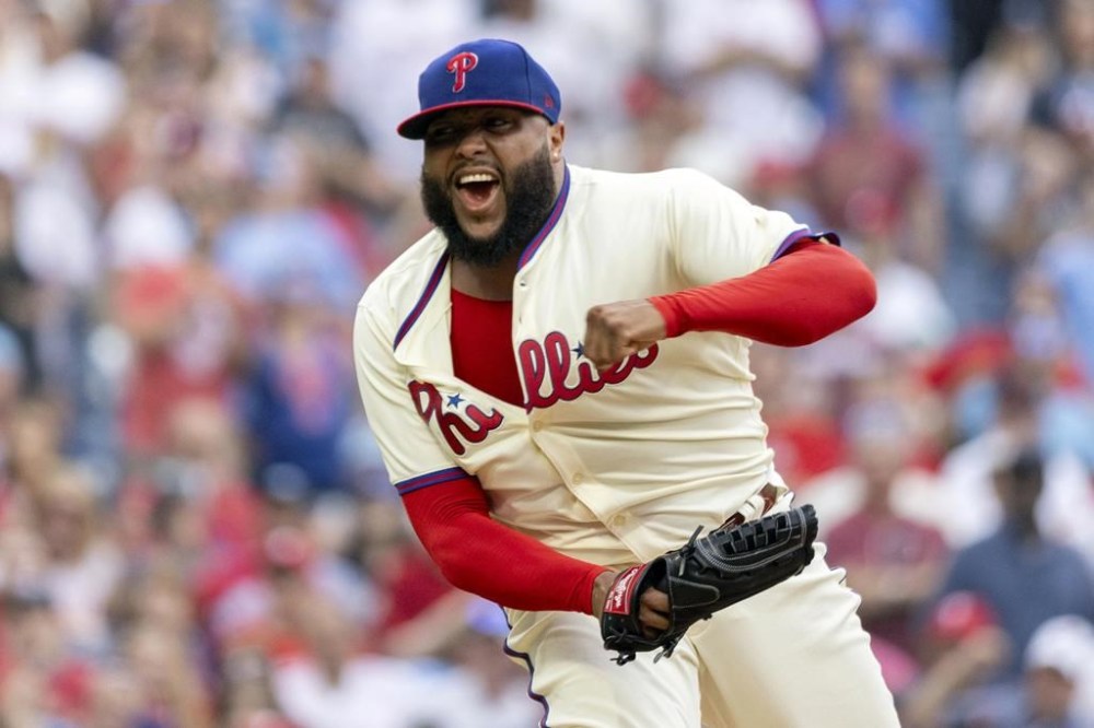 Philadelphia Phillies closing pitcher Jose Alvarado cheers after his team defeated the Milwaukee Brewers in a baseball game, Wednesday, June 5, 2024, in Philadelphia. (AP Photo/Laurence Kesterson)