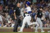 Chicago Cubs' Yan Gomes scores on a sacrifice fly from Cody Bellinger to tie the baseball game with the Chicago White Sox 5-5 during the seventh inning Wednesday, June 5, 2024, in Chicago. (AP Photo/Erin Hooley)