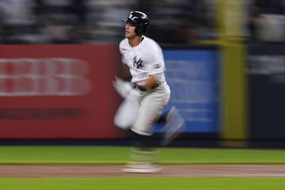 New York Yankees' Anthony Volpe runs for a triple against the Minnesota Twins during the eighth inning of a baseball game Wednesday, June 5, 2024, in New York. (AP Photo/Frank Franklin II)