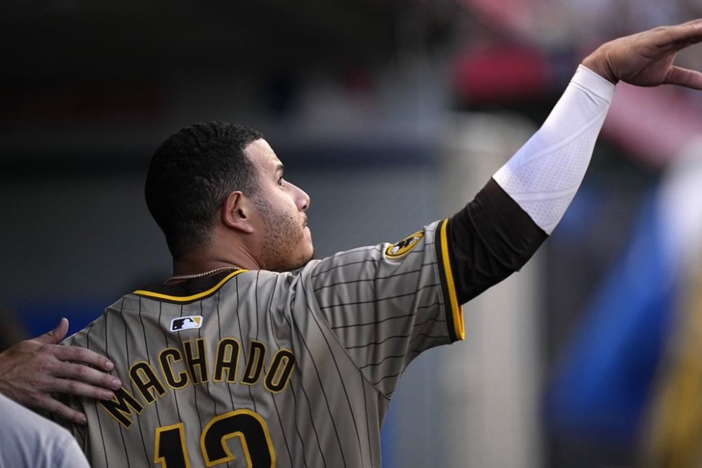 San Diego Padres' Manny Machado tosses his gum away after being taken out of the game with an injury during the fourth inning of a baseball game against the Los Angeles Angels Wednesday, June 5, 2024, in Anaheim, Calif. (AP Photo/Mark J. Terrill)