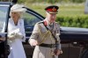 Britain's King Charles III and Britain's Queen Camilla arrive to a commemorative ceremony marking the 80th anniversary of the World War II D-Day