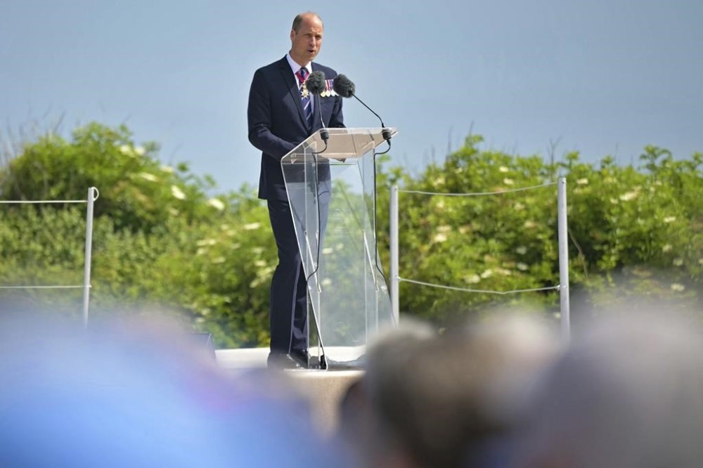 Britain's Prince William, the Prince of Wales delivers his speech during the Canadian commemorative ceremony marking the 80th anniversary of the World War II D-Day landing, at the Juno Beach Centre near Courseulles-sur-Mer, Normandy, Thursday, June 6, 2024. Normandy is hosting various events to officially commemorate the 80th anniversary of the D-Day landings that took place on June 6, 1944. (Lou Benoist, Pool via AP)