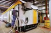 Construction tradesmen build portable housing for oil sands workers at the ATCO Structures facility in Calgary, Alta., Thursday, Feb. 2, 2012. The structures division of ATCO Ltd. has signed a deal to buy NRB Ltd., a maker of modular buildings, for $40 million. THE CANADIAN PRESS IMAGES/Jeff McIntosh