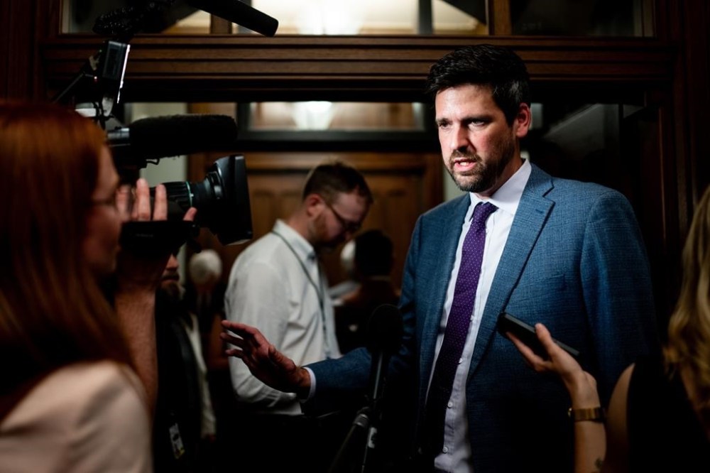 Sean Fraser, Minister of Housing, Infrastructure and Communites speaks to reporters prior to a cabinet meeting on Parliament Hill in Ottawa, on Tuesday, June 4, 2024. THE CANADIAN PRESS/Spencer Colby