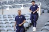 England's Harry Kane and Harry Maguire, right, walk down the stands before an international friendly soccer match between England and Bosnia and Herzegovina at St. James Park in Newcastle, England, Monday, June 3, 2024. (AP Photo/Scott Heppell)