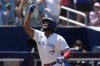 Toronto Blue Jays' Vladimir Guerrero Jr. celebrates after hitting a three-run home run off Baltimore Orioles pitcher Cade Povich during third-inning American League MLB baseball action in Toronto on Thursday June 6, 2024. THE CANADIAN PRESS/Chris Young