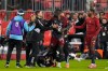 Toronto FC forward Prince Osei Owusu (99) is restrained by team staff members after MLS action against New York City in Toronto, Saturday, May 11, 2024. THE CANADIAN PRESS/Frank Gunn
