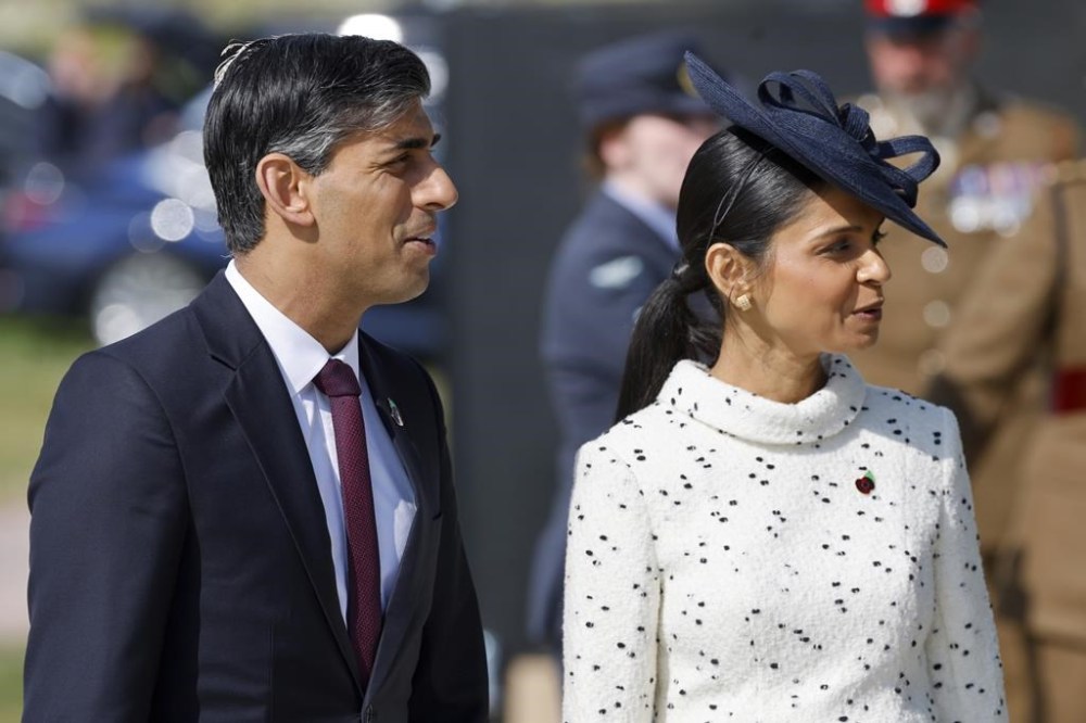 Britain's Prime Minister Rishi Sunak and his wife, Akshata Murty attend a commemorative ceremony marking the 80th anniversary of the World War II D-Day