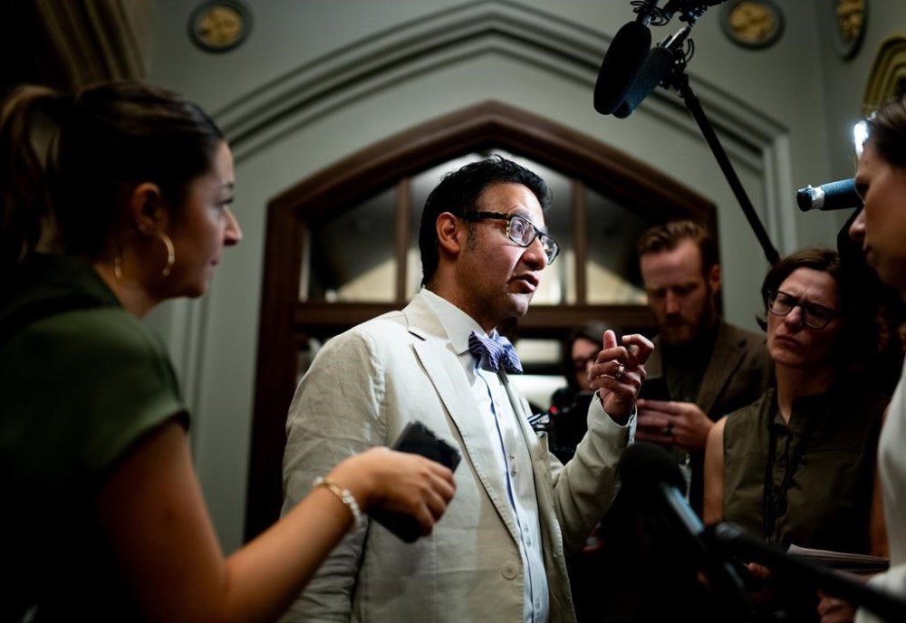 Arif Virani, Minister of Justice and Attorney General speaks to reporters prior to a cabinet meeting on Parliament Hill in Ottawa, on Tuesday, June 4, 2024. Canada's justice minister says he's open to amending the government's long-awaited legislation aimed at protecting Canadians against online harms, while the Opposition Conservatives say the Liberals could instead move faster by modernizing existing laws. THE CANADIAN PRESS/Spencer Colby