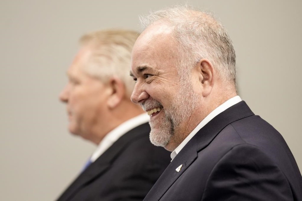 Todd Smith, then Ontario minister of Energy, attends a housing announcement with Ontario Premier Doug Ford, in Belleville, Ont., on Friday, March 1, 2024. Smith is now Ontario's new minister of education. THE CANADIAN PRESS/Chris Young