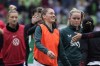 FILE - Republic of Ireland's Sinead Farrelly, center, greets players after the team's match with the United States in an international friendly soccer match in Austin, Texas, Saturday, April 8, 2023. Farrelly, who represented the United States early in her career in youth soccer and Ireland late in the Women's World Cup, is retiring because of cumulative head injuries sustained throughout her career the National Women's Soccer League announced Friday, June 7, 2024. (AP Photo/Eric Gay, File)