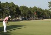 FILE - Martin Kaymer, of Germany, putts on the 13th hole during the third round of the U.S. Open golf tournament in Pinehurst, N.C., Saturday, June 14, 2014. The U.S. Open returns to Pinehurst on June 13-16, 2024. The course is renowned for its sandy dunes and turtleback greens. (AP Photo/Chuck Burton, File)