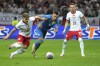 Poland's Michal Skoras, left, challenges for the ball with Ukraine's Oleksandr Zubkov during the international friendly soccer match between Poland and Ukraine at the National stadium in Warsaw, Poland, Friday, June 7, 2024. (AP Photo/Czarek Sokolowski)