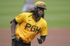 Pittsburgh Pirates' Oneil Cruz rounds third base after hitting a solo home run off Minnesota Twins starting pitcher Joe Ryan, left, during the second inning of a baseball game in Pittsburgh, Friday, June 7, 2024. (AP Photo/Gene J. Puskar)