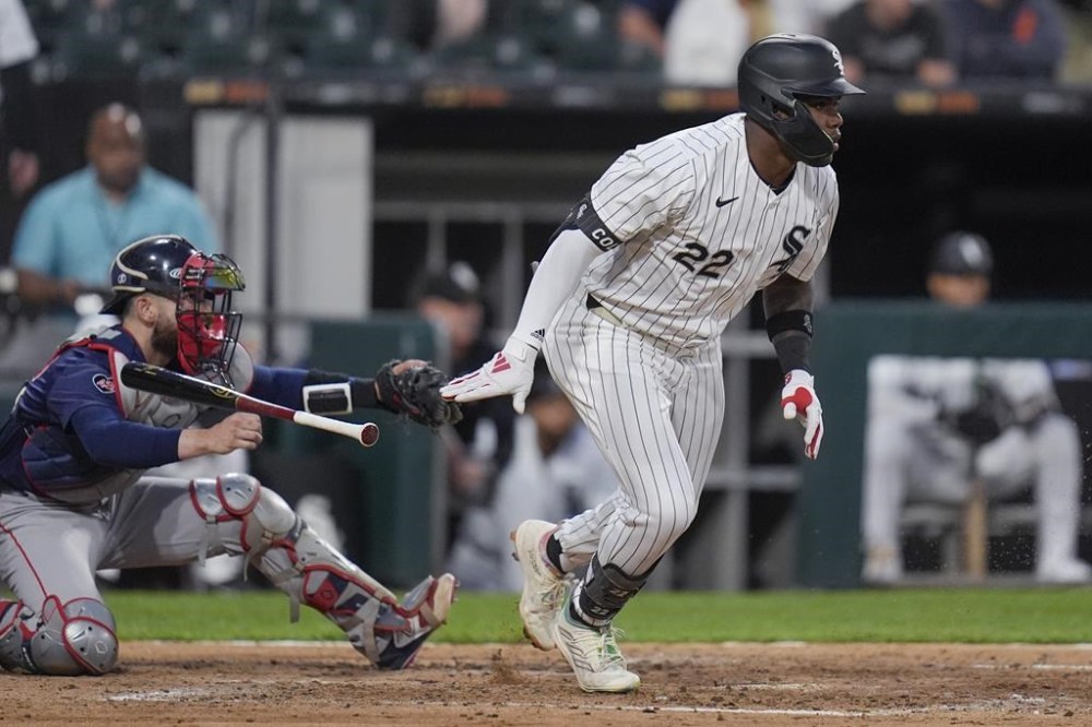 Chicago White Sox's Oscar Colás heads to first on a single against the Boston Red Sox during the fourth inning of a baseball game Friday, June 7, 2024, in Chicago. (AP Photo/Erin Hooley)