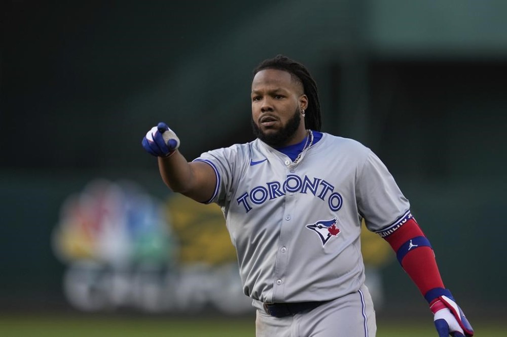Toronto Blue Jays' Vladimir Guerrero Jr. reacts after hitting into a double play during the fourth inning of a baseball game against the Oakland Athletics, Friday, June 7, 2024, in Oakland, Calif. (AP Photo/Godofredo A. Vásquez)