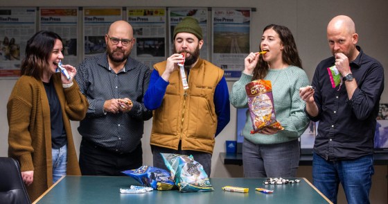 From left: Jen Zoratti, Al Small, Ben Waldman, Eva Wasney and Ben Sigurdson taste test Halloween candy in October 2022. (Mikaela MacKenzie / Free Press files)