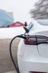 MIKAELA MACKENZIE / FREE PRESS FILES
                                A Tesla charges at The Forks.