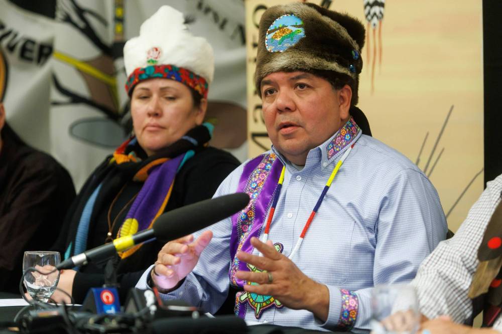MIKE DEAL / FREE PRESS
Brokenhead Ojibway Chief Gordon Bluesky, right, says the three levels of government aren’t taking the contamination of Lake Winnipeg seriously after more than 228 million litres of raw sewage flowed into the Red River from Feb. 7 to 23.