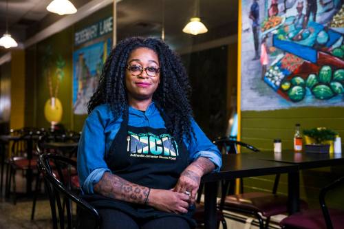 MIKAELA MACKENZIE / FREE PRESS FILES
                                Christine Pattison, owner of Miss Christine&rsquo;s Kitchen, poses for a portrait in her authentic Jamaican restaurant in 2020.