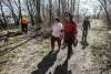 JOHN WOODS / FREE PRESS
                                Britt Moberg, red, friends, family and the Bear Clan searched near the Red River and Chief Peguis Trail for the remains of her father Earl Morberg who disappeared late December when he wandered away from his home in Winnipeg, Sunday, May 5, 2024.