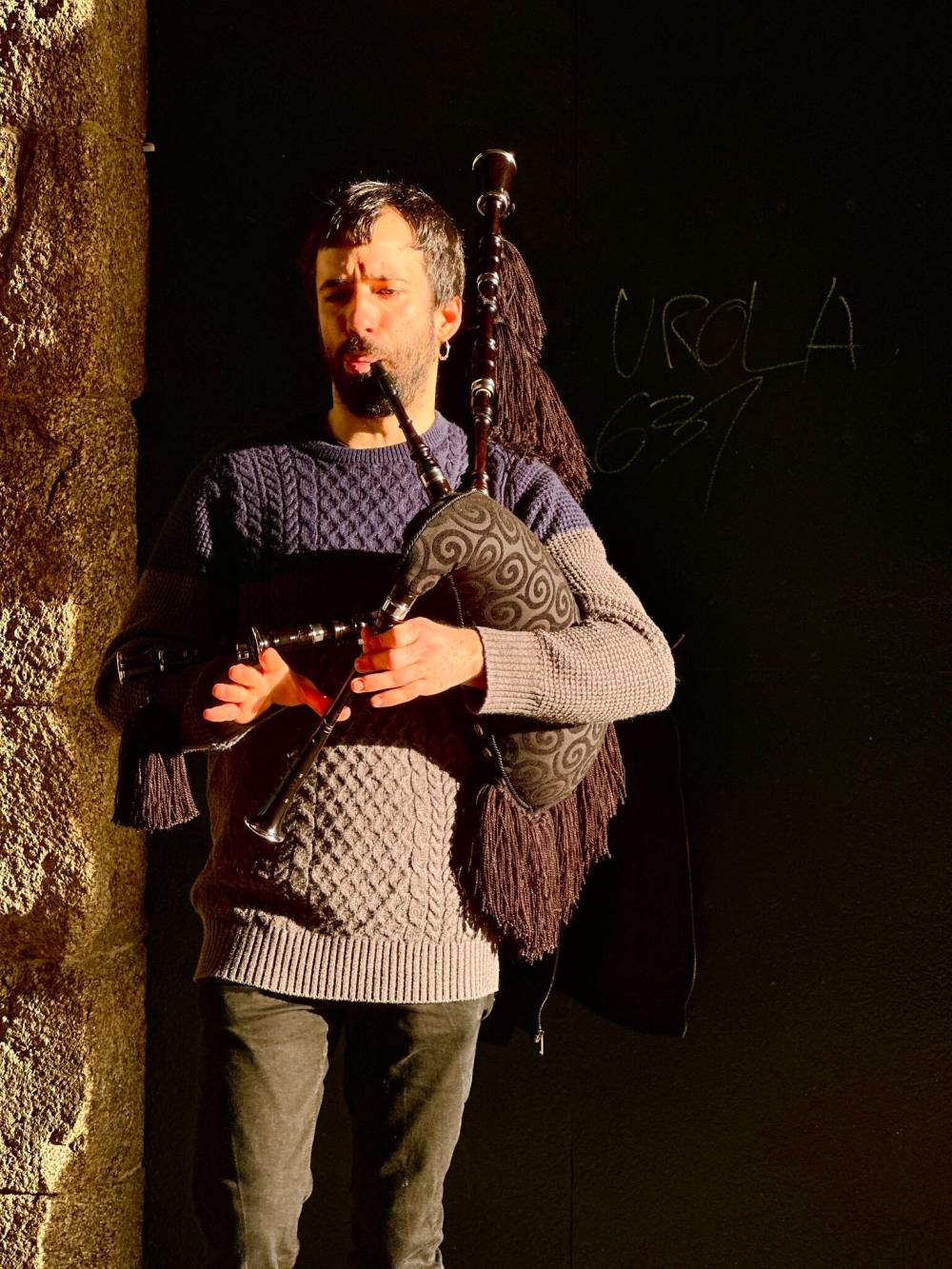 You’ll find many Celtic symbols, words and practices in Santiago del Compostela, including a lone bagpipe player.