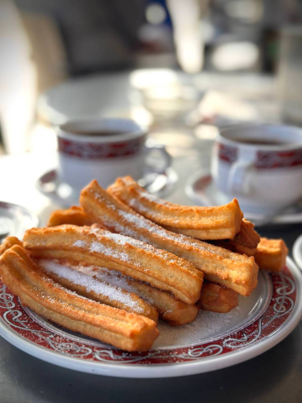 To soak up the seaside vibe, grab an outdoor table at Cafeteria Monterrey and order chocolate and churros.