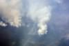KEN GIGLIOTTI / FREE PRESS FILES
                                JUNE 24 2010 - 100624 - forest fire south east of Cranberry Portage (20km from Flin Flon ) was blanketed in smoke this morning . Several residents left under a voluntary evacuation .The wind clanged by the afternoon and the air was clear. Water bombers continue to fight the 10,000 hectare