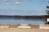 (Tim Smith/The Brandon Sun)
                                Concrete barriers block vehicle and boat access to the Wasagaming boat launch at Clear Lake in Riding Mountain National Park on Thursday. A decision about whether boats and other water craft will be allowed onto Clear Lake this year is expected ahead of the upcoming May long weekend.