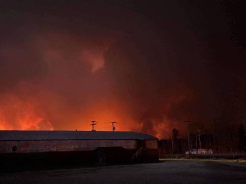 Cranberry Portage was evacuated Saturday night, as a wildlife spread close to the northern community. (Heather Charlette / Facebook)