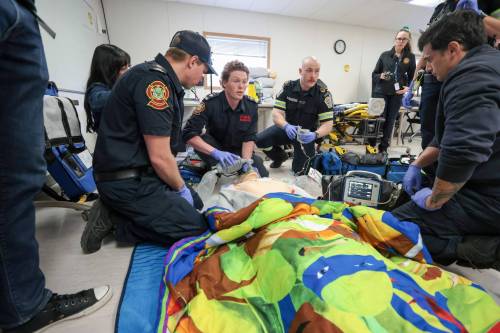 RUTH BONNEVILLE / FREE PRESS 
                                The Winnipeg Fire Paramedic Service goes through a mock demonstration on diagnosing STEMI heart attacks during a 911 cardiac arrest at the training academy Wednesday.