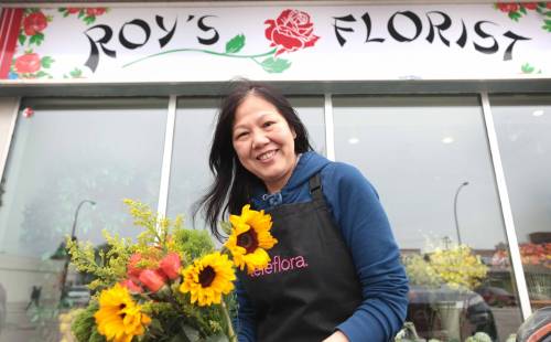 RUTH BONNEVILLE / FREE PRESS
                                Debby Chan, owner, at Roy&rsquo;s Florist which has moved to 150 Goulet St. In St Boniface after 60+ years on Notre Dame.