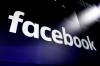 FILE - In this March 29, 2018 file photo, the logo for social media giant Facebook, appears on screens at the Nasdaq MarketSite, in New York’s Times Square. The Wall Street Journal reports that Facebook plans a cryptocurrency-based payment system that it could launch for its billions of users worldwide. The system would use a digital coin similar to bitcoin, but different in that Facebook would aim to keep the coin’s value stable. (AP Photo/Richard Drew, File)