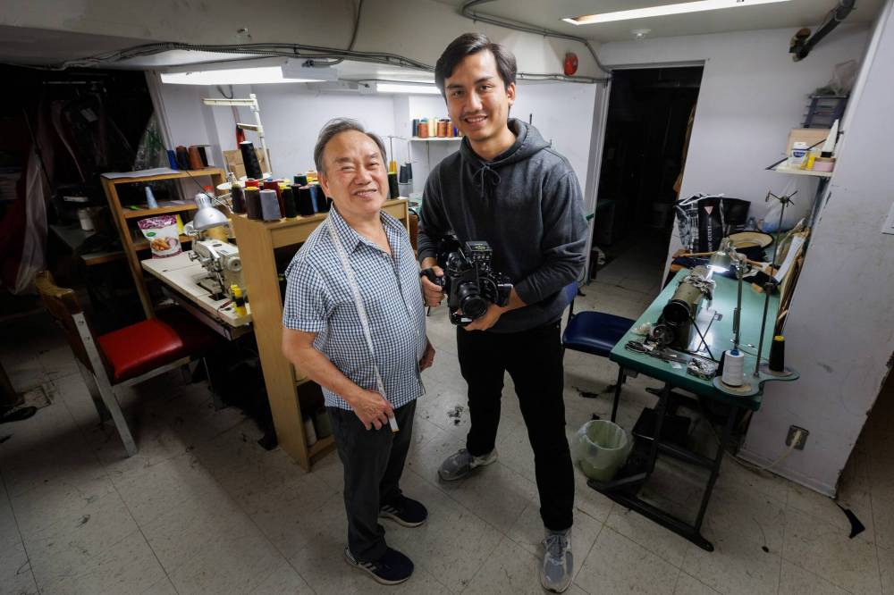MIKE DEAL / FREE PRESS
Director Quan Luong (right) and Tam Nguyen in Tam Custom Tailor at 802 Ellice Ave., where the documentary Tailor Made was shot.