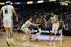Saskatchewan guard Elijah Harkless (centre) eludes Winnipeg defenders Mason Bourcier (left) and Shane Osayande.(CEBL photo)