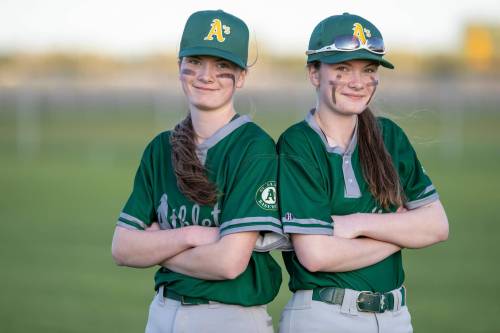 BROOK JONES / FREE PRESS
                                St. James A&rsquo;s (Yellow - female team) twin sisters Josie Miller (left) and Olivia Miller are pictured following the team&rsquo;s home game against the St. James A&rsquo;s (Green) in Winnipeg Minor Baseball League 15U AA action at St. James Optimist Fields in Winnipeg, Man., Wednesday, May 22, 2024. The St. James A&rsquo;s (Yellow - female team) earned their first win of the 2024 season after earning a 6-2 vicrtory over the St. James A&rsquo;s (Green).