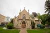 BROOK JONES / FREE PRESS Holy Trinity Church at 256 Smith St. in Winnipeg, Man., that was built in 1983-84 as a long cruciform-shaped stone structure is pictured Friday, May 24, 2024. The church parish has request permission of the Diocese of Rupter’s Land to sell the Victoria-era Gothic Revial architecturally designed church.