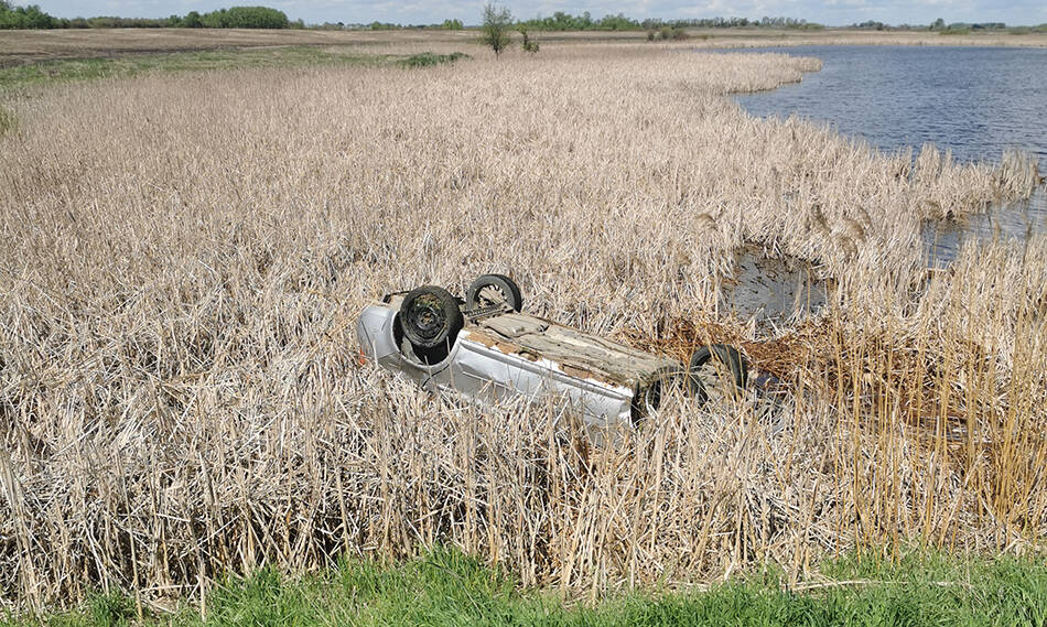 SUPPLIED
Ben Cameron’s car landed on its roof after crashing on Highway 18.